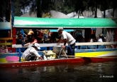 Food being served to the tourists......Vendors sell everything from food to plants to other handicraft from their boats!